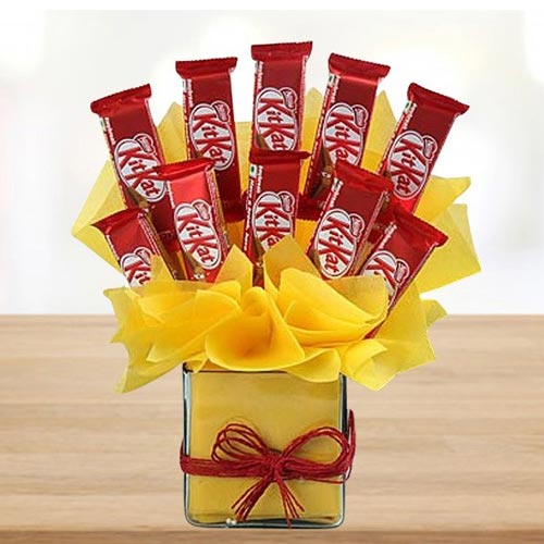 Marvelous Arrangement of Kitkat Chocolates in Glass Vase