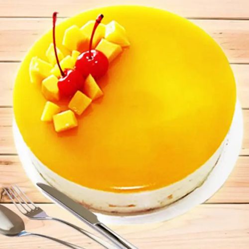 Scrumptious Eggless Mango Cake with Cherry N Mango Topping