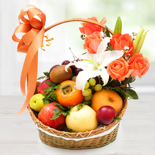 Carefully Selected Imported Fruits Basket with Orange Roses n White Lily