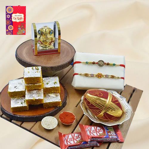 Elegant Swastik Rakhi Pair with Puja Item Haldiram Sweets N Chocolates