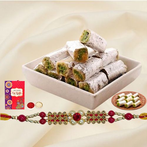 Tasty Kaju Pista Roll & fancy Rakhi with free Roli Tilak Chawal