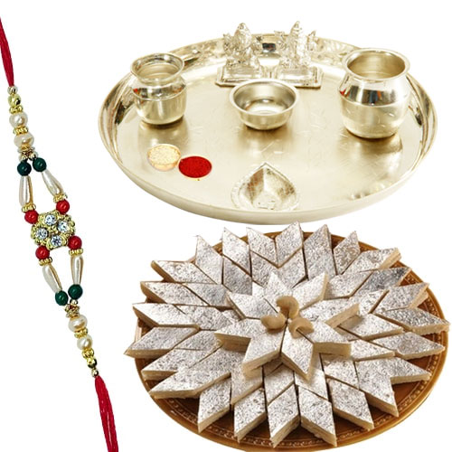 Appealing Haldiram Katli and free Rakhi Roli Tilak N Chawal with Silver Plated Pooja Thali on the Occasion of Raksha Bandhan