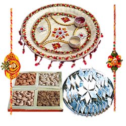 Enticing Rakhi Special Gift of Pooja Thali Dry Fruits and Delicious Kaju Katli with 2 Free Rakhi Roli Tika and Chawal